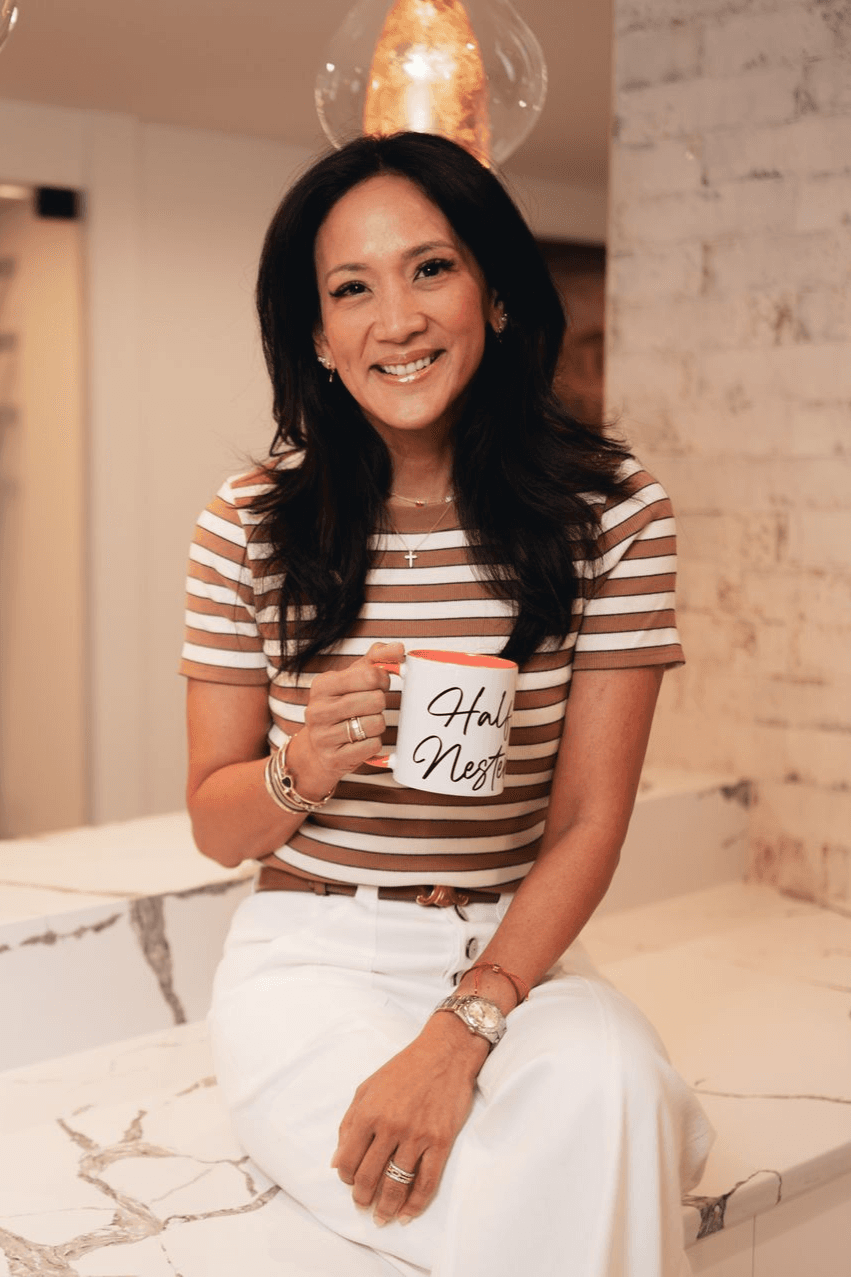 Dr. Valerie Woo with a Half Nester mug