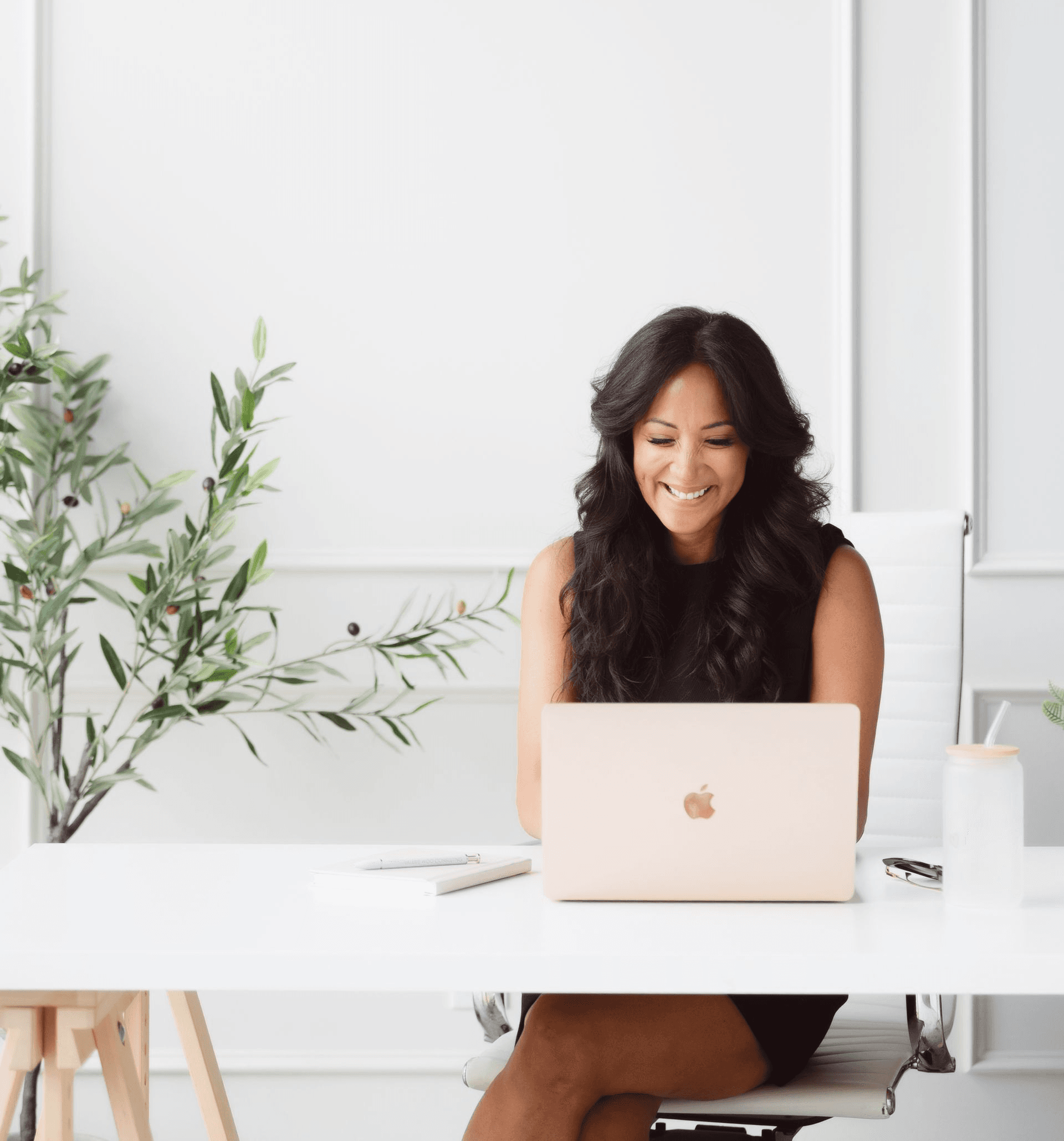Dr. Valerie Woo working at her desk